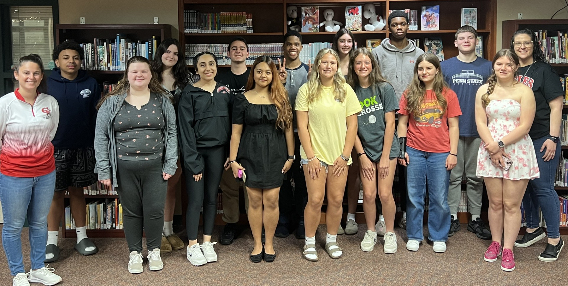 CV9 Soaring Eagle Winners are standing together during their celebratory Soaring Eagles breakfast at the CV High School. 