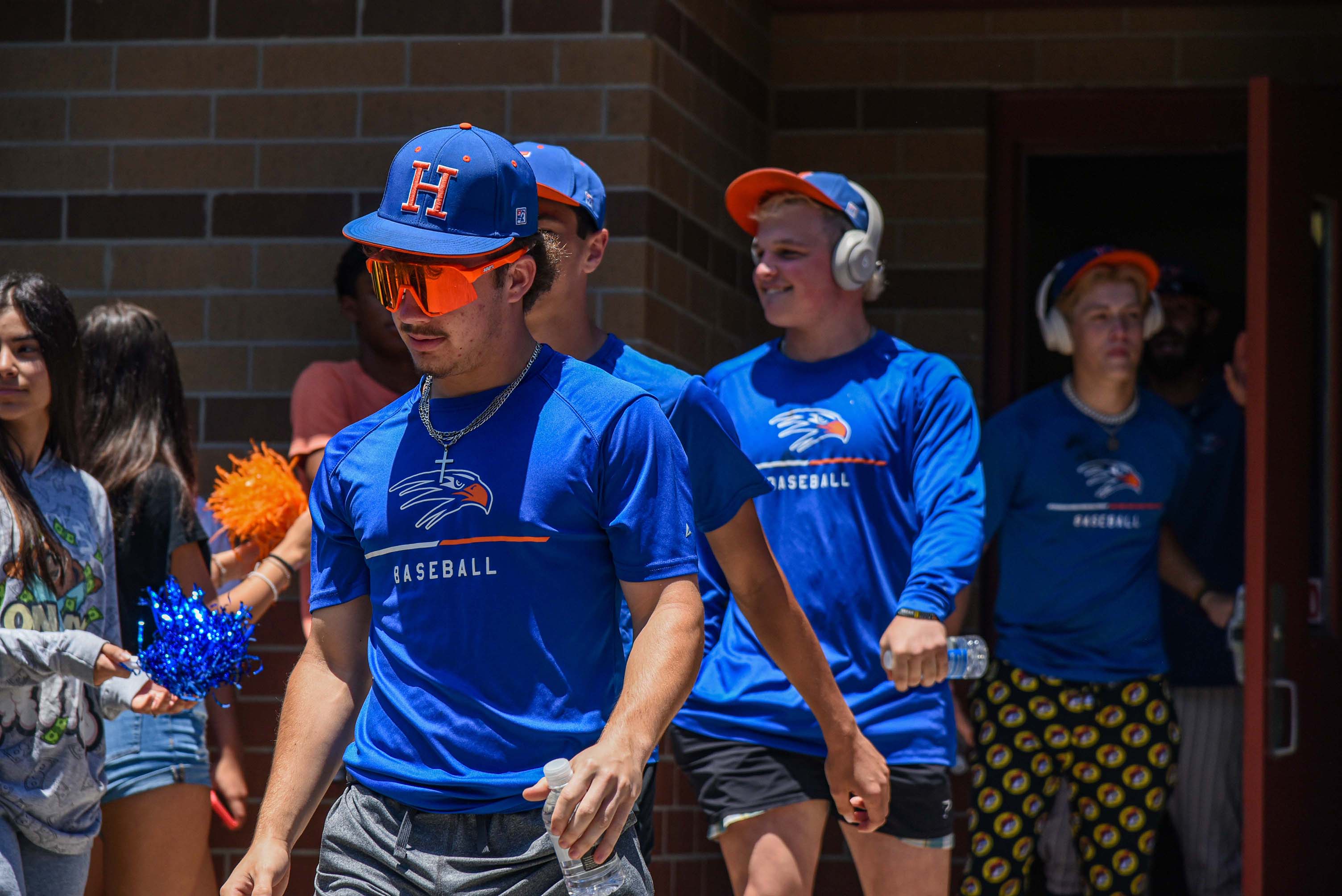 baseball team walking out of tunnel