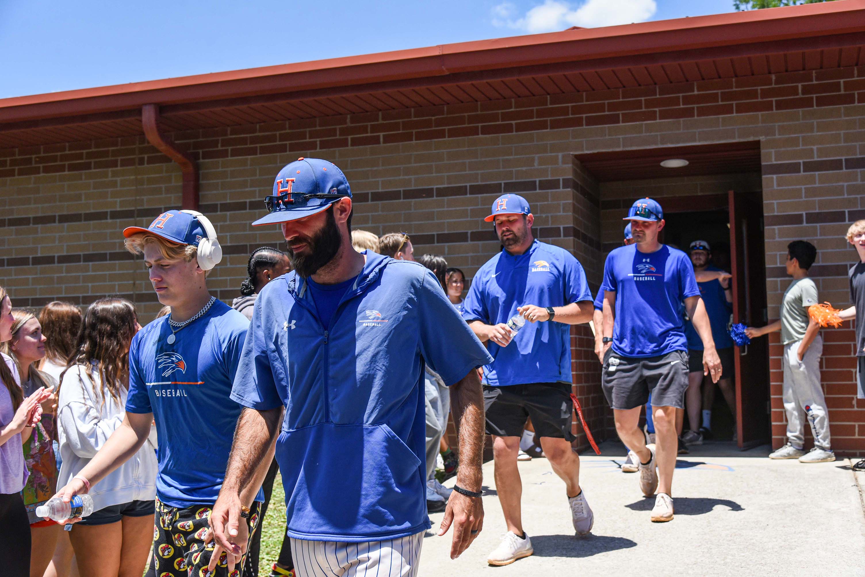 baseball team walking out of tunnel