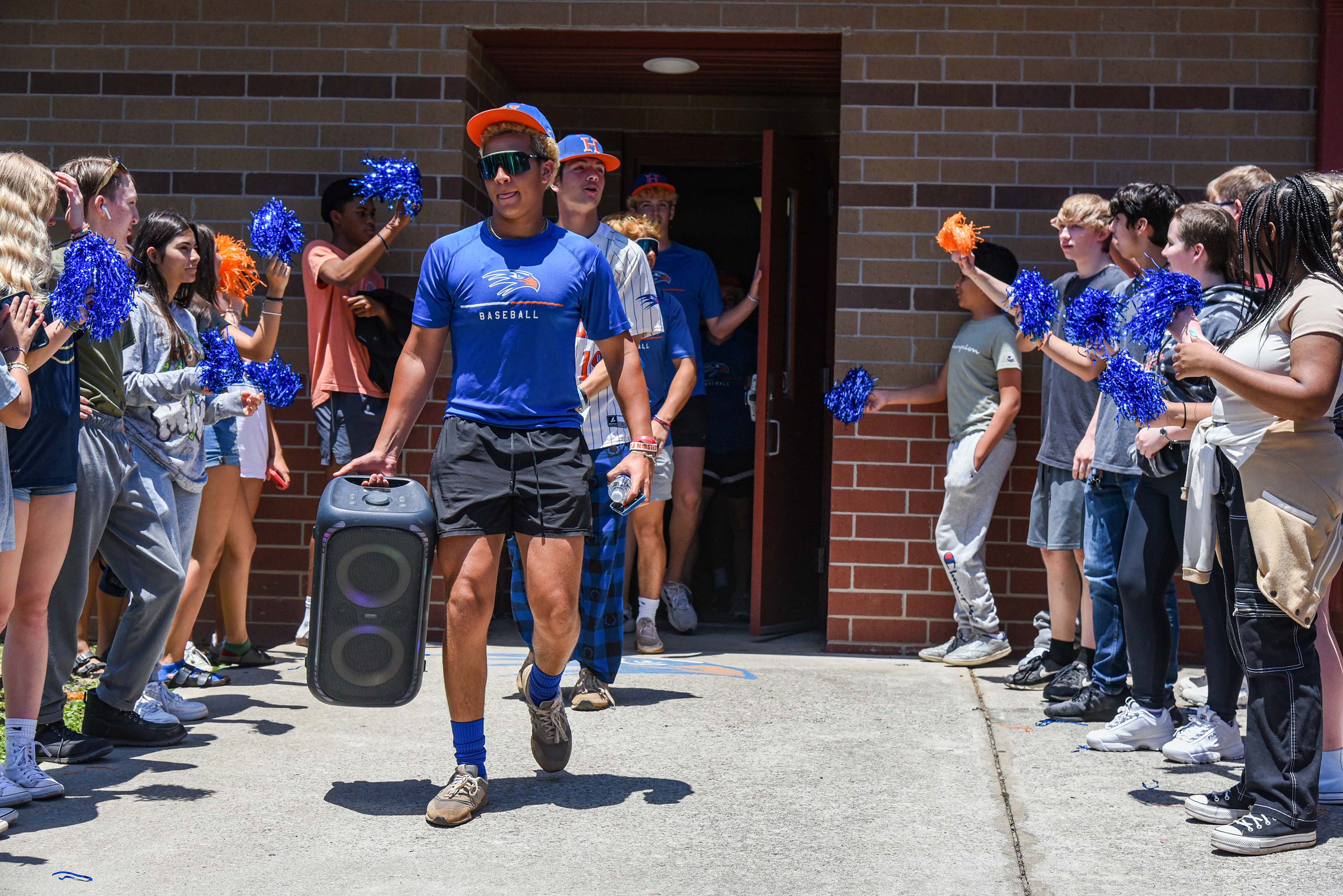 baseball team walking out of tunnel