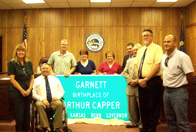 group of people inside the government office of Kansas