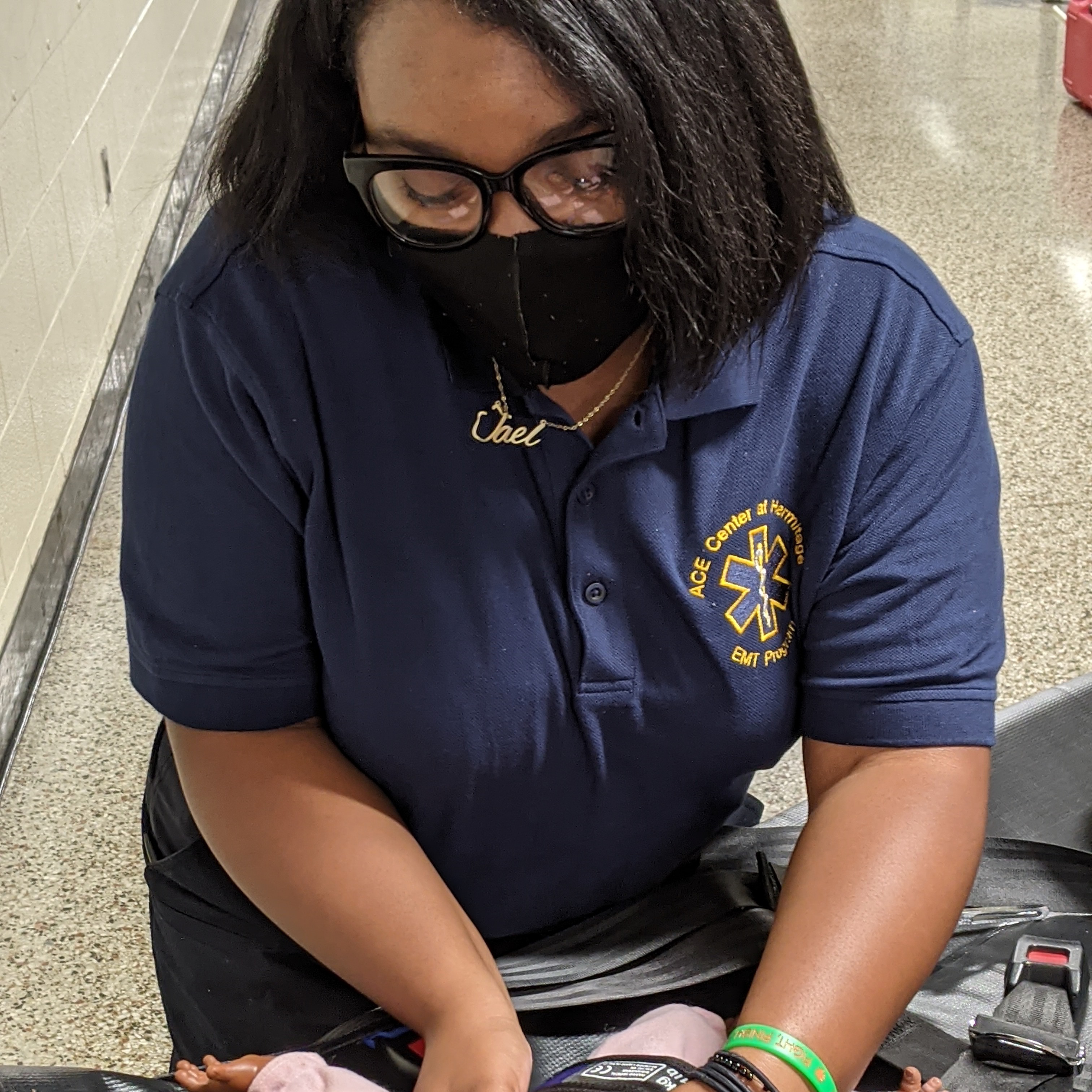 Girl practicing CPR