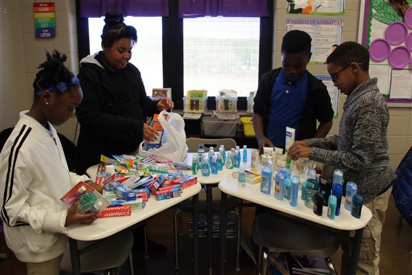 Student Leadership Council members collecting supplies