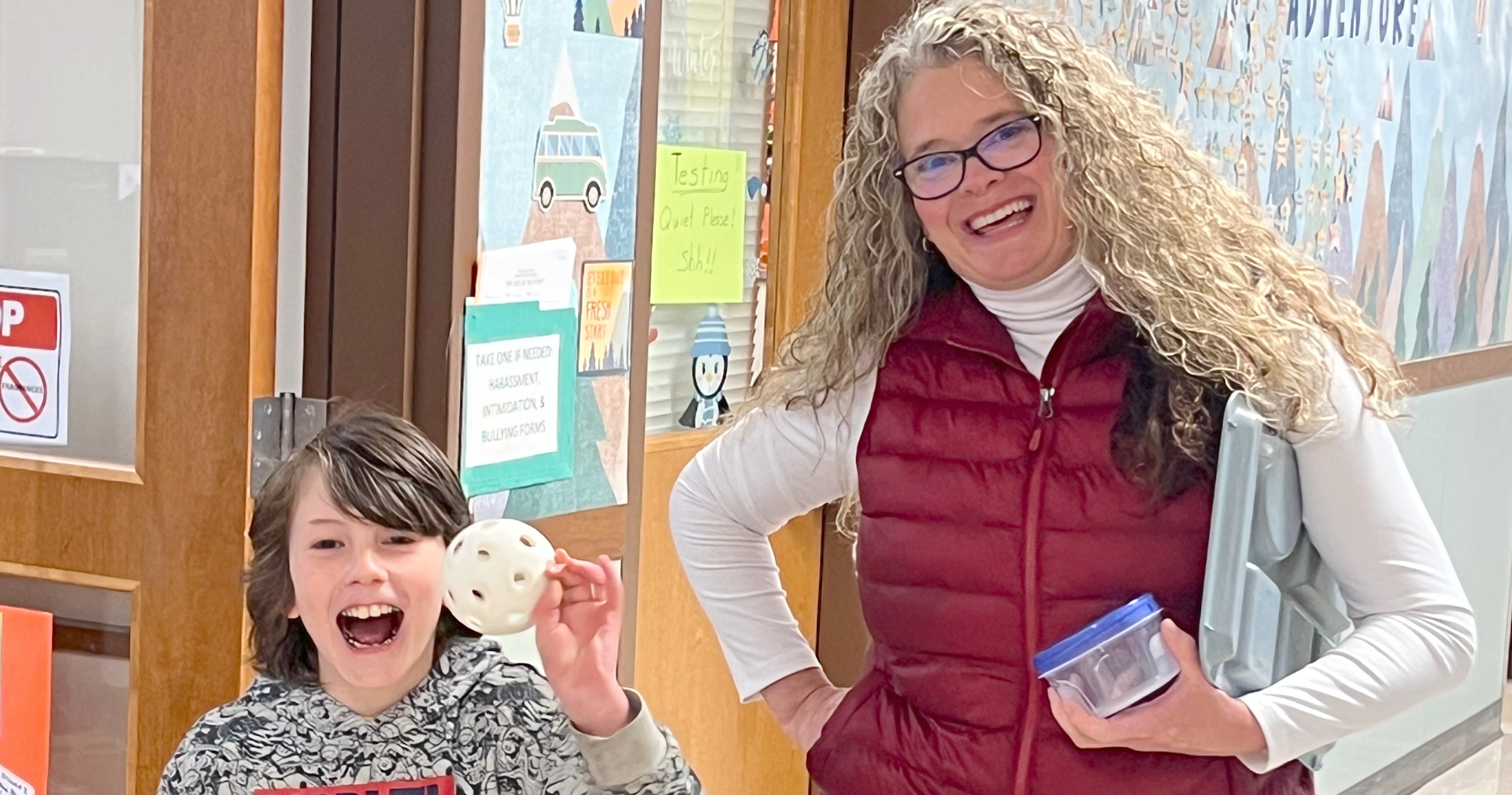 Counselor and Kid Smiles
