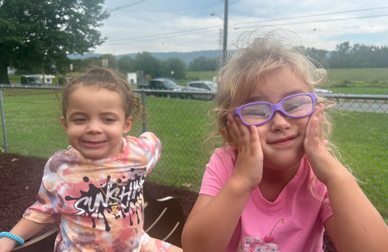 TWo children making funny faces