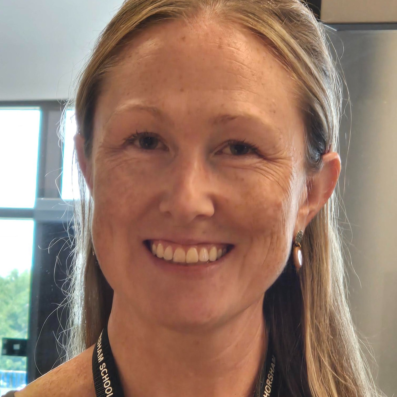 A woman smiling