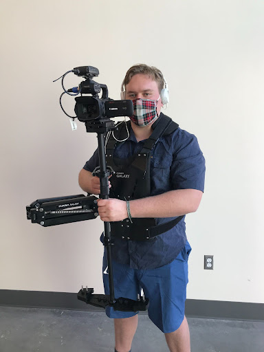 Student with steady cam rig