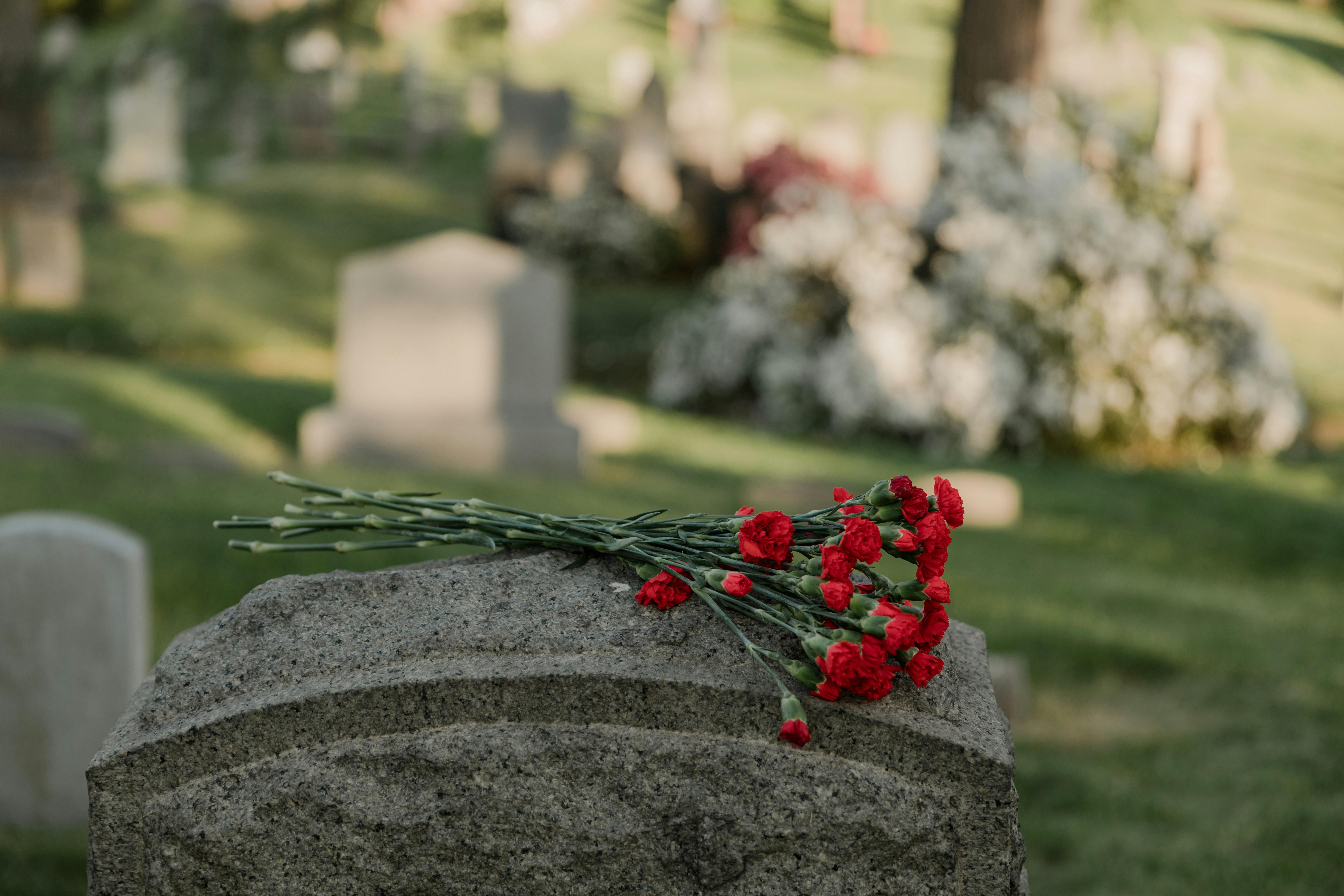 Headstone with flowers