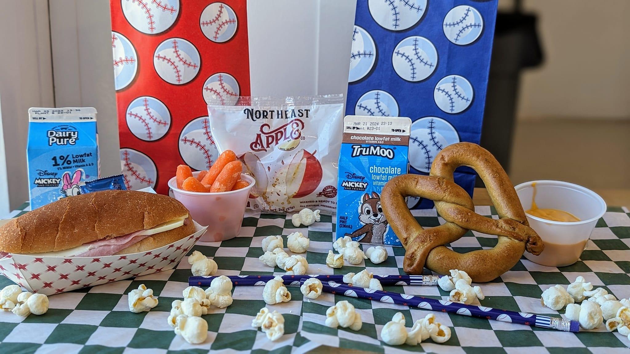 A table topped with pretzels, pretzels and other foods