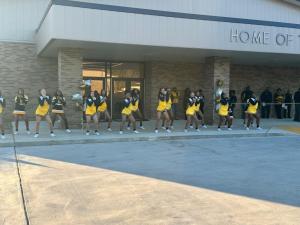 Cheerleading team outside the Arcadia gym