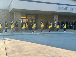 Cheerleading team outside the Arcadia gym