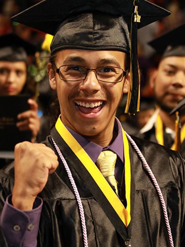 students making a fist bump