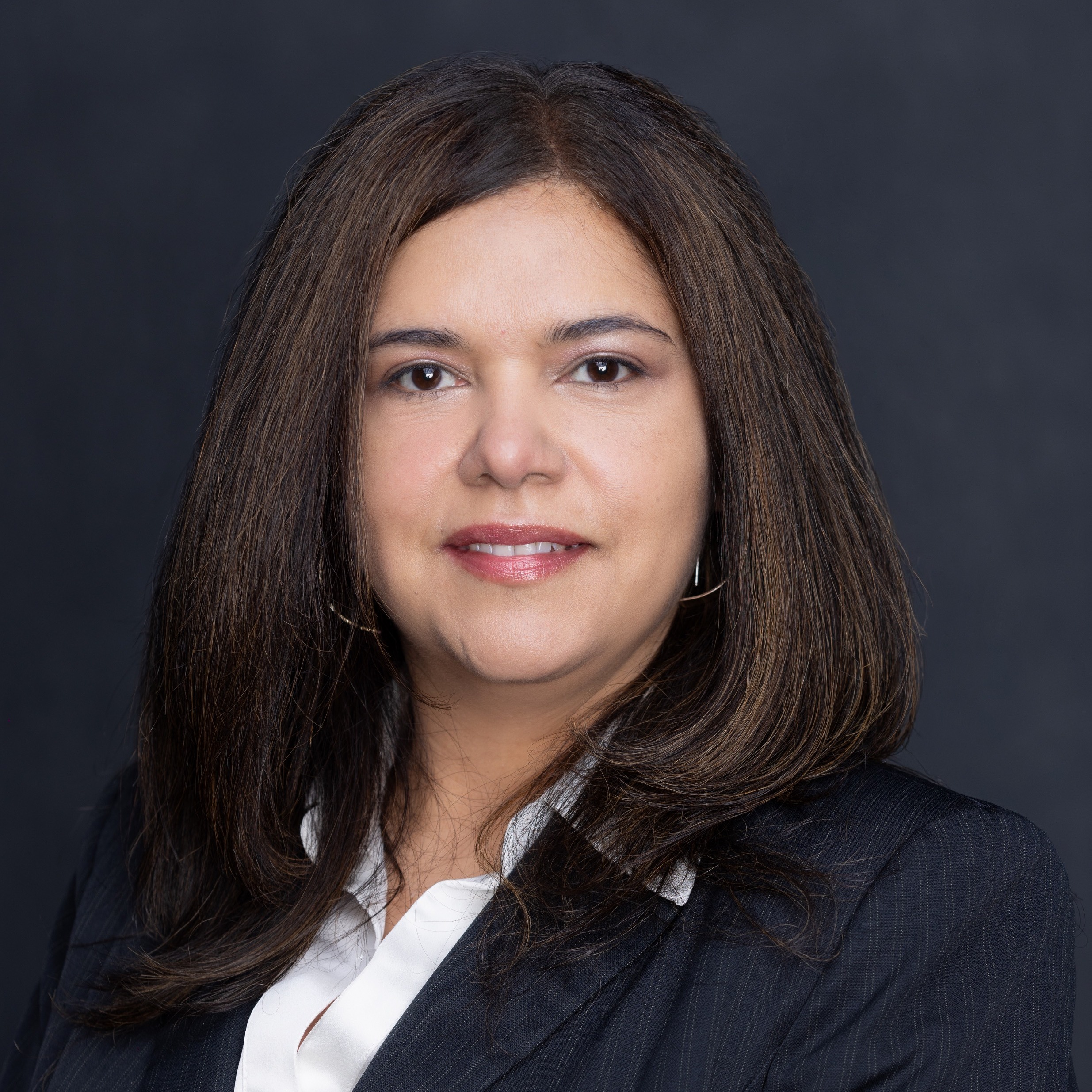 Belen Briones, Comptroller