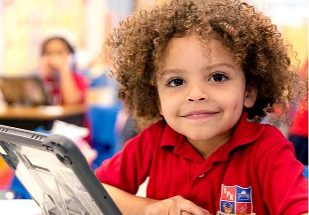 Young boy with a laptop