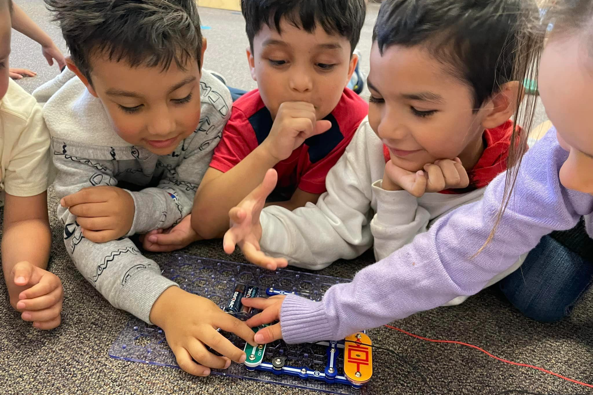 Children programing robots