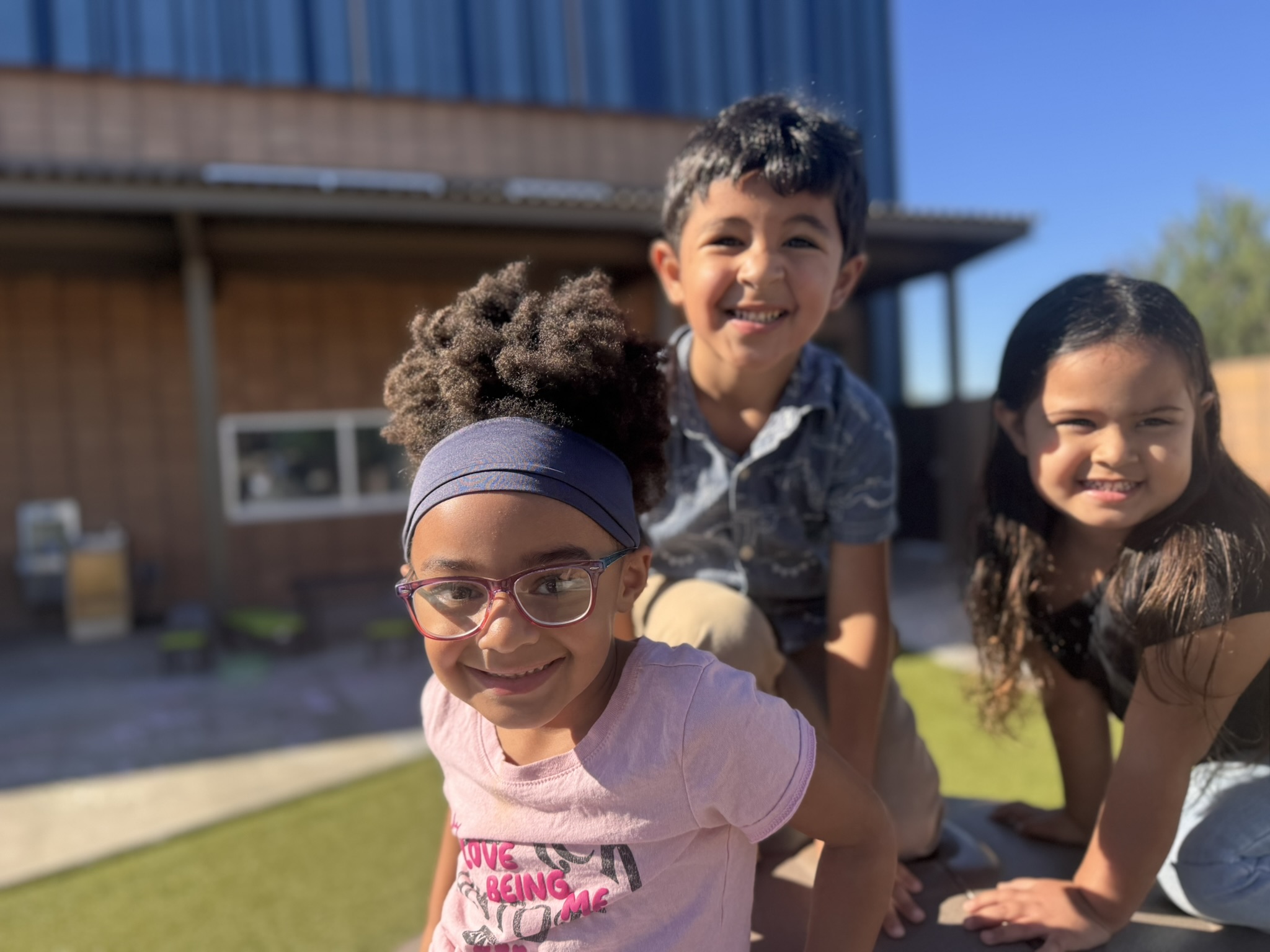 Students climbing outdoors at their center. 