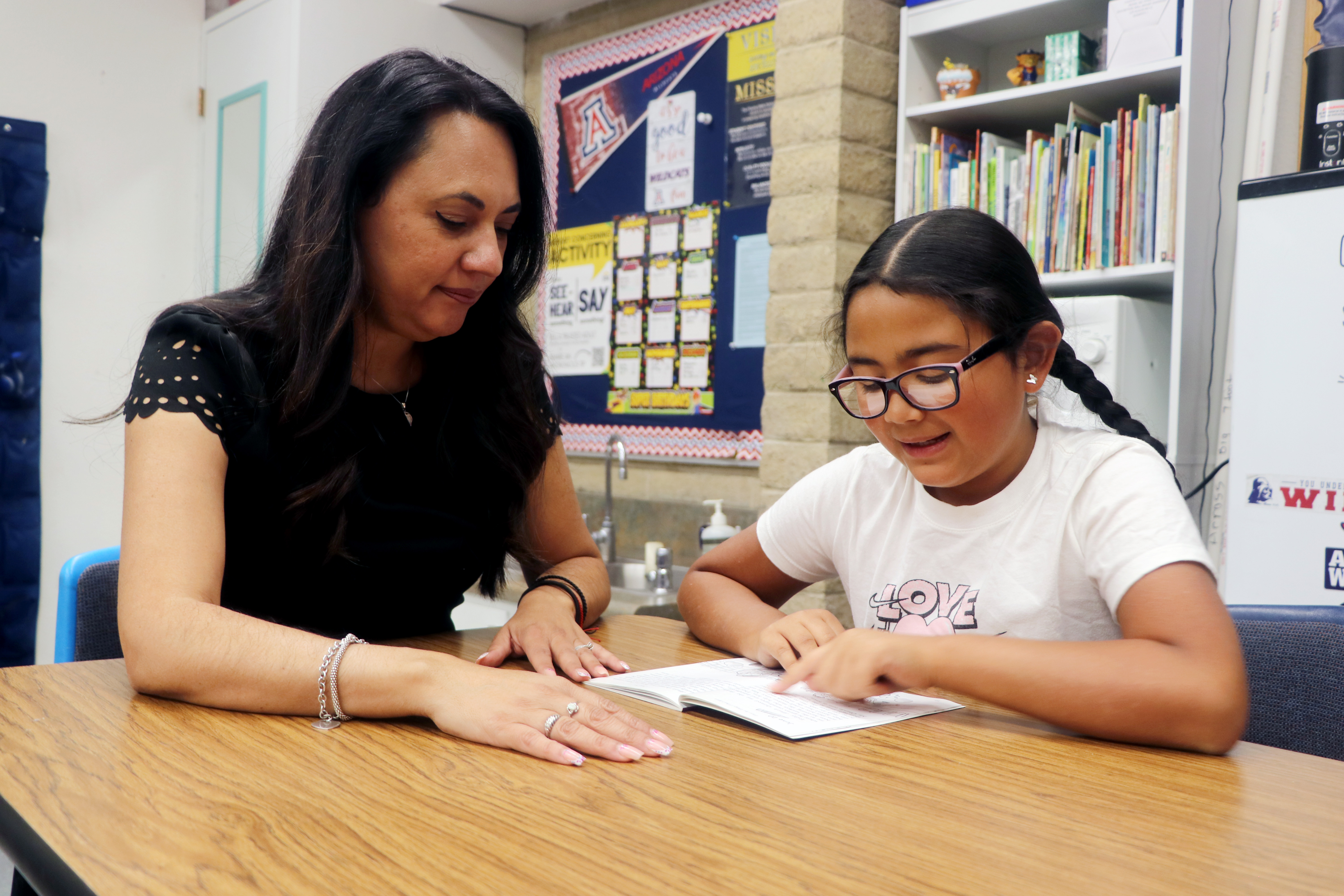 teacher and student reading