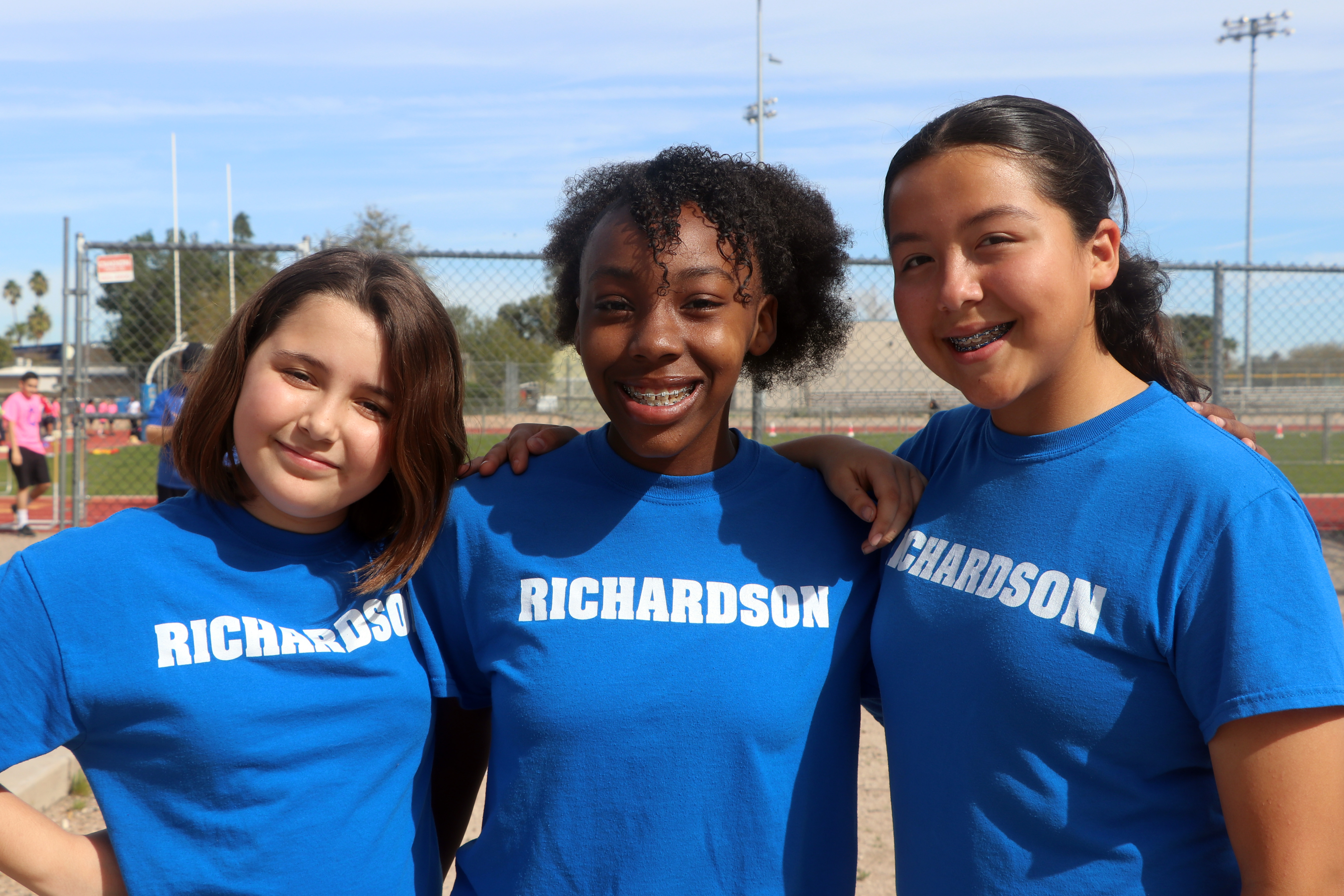 Richardson girls smiling at the Track Meet
