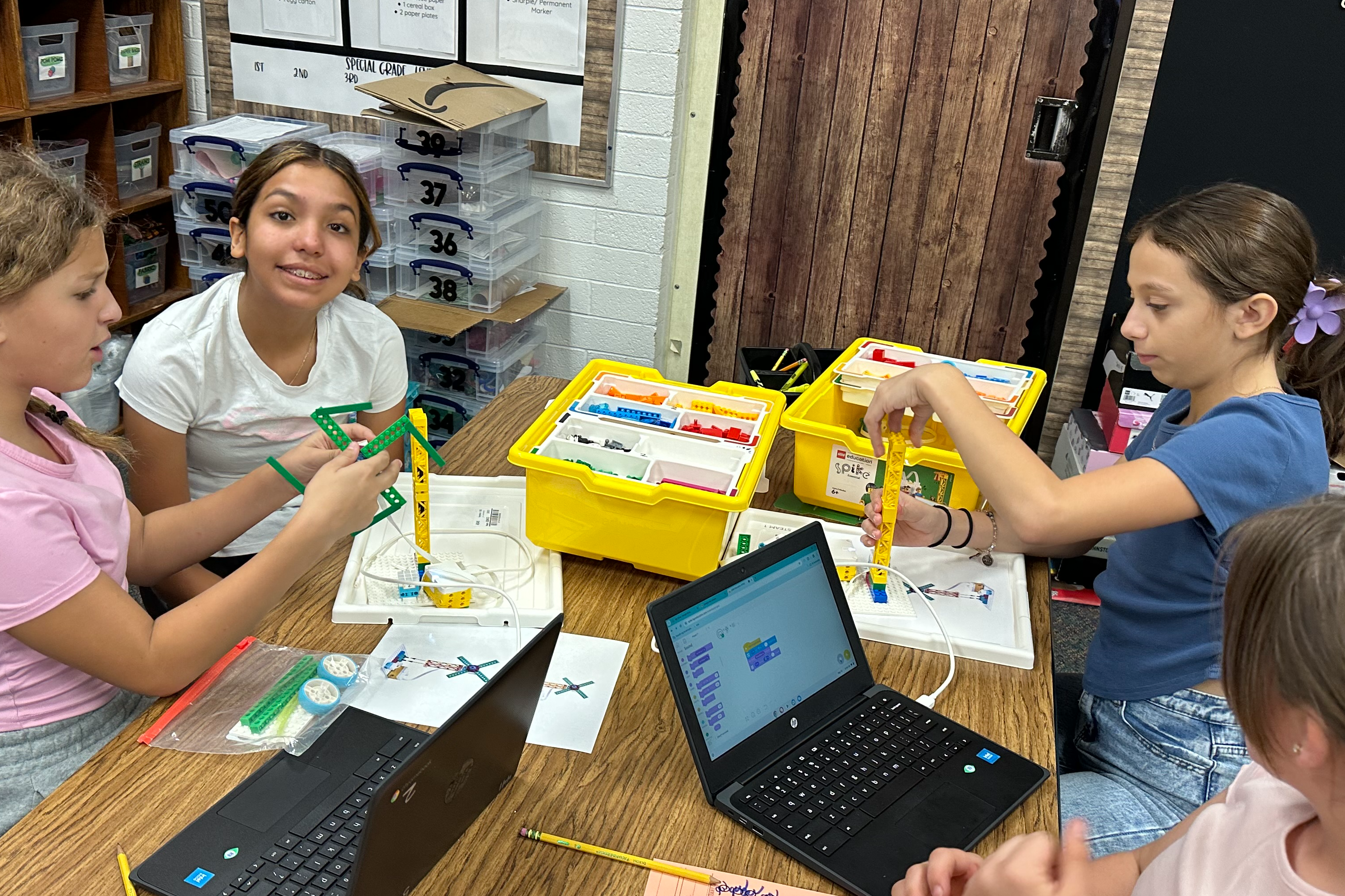 4 girls coding their Lego build