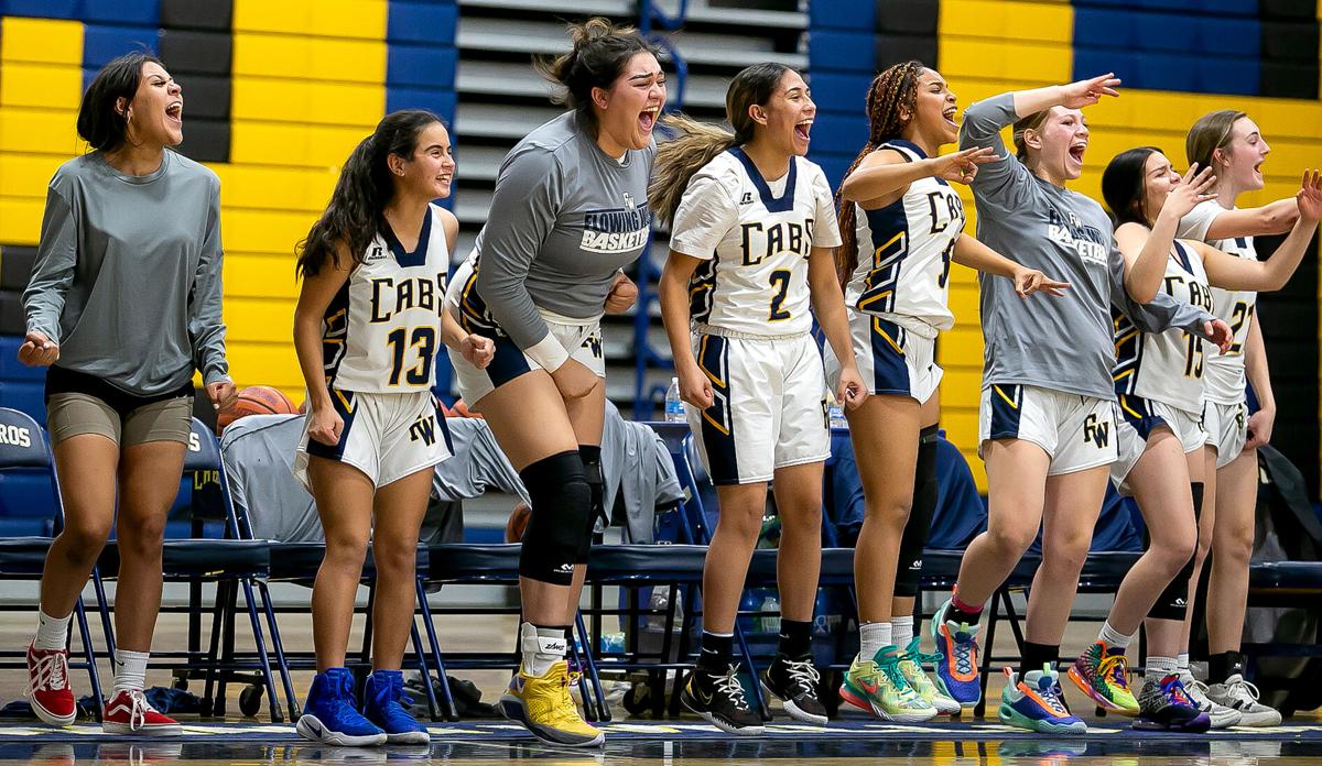 girls basketball team cheering