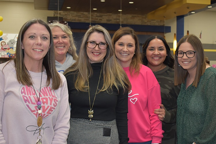 group of teachers smiling