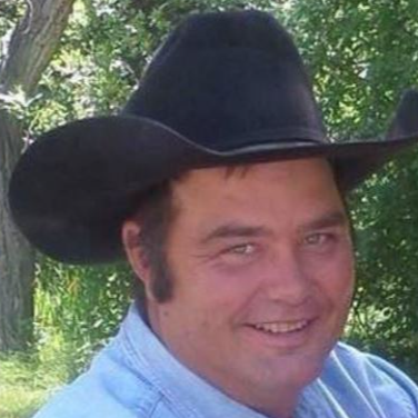 man with black cowboy hat