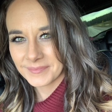 woman wearing maroon shirt