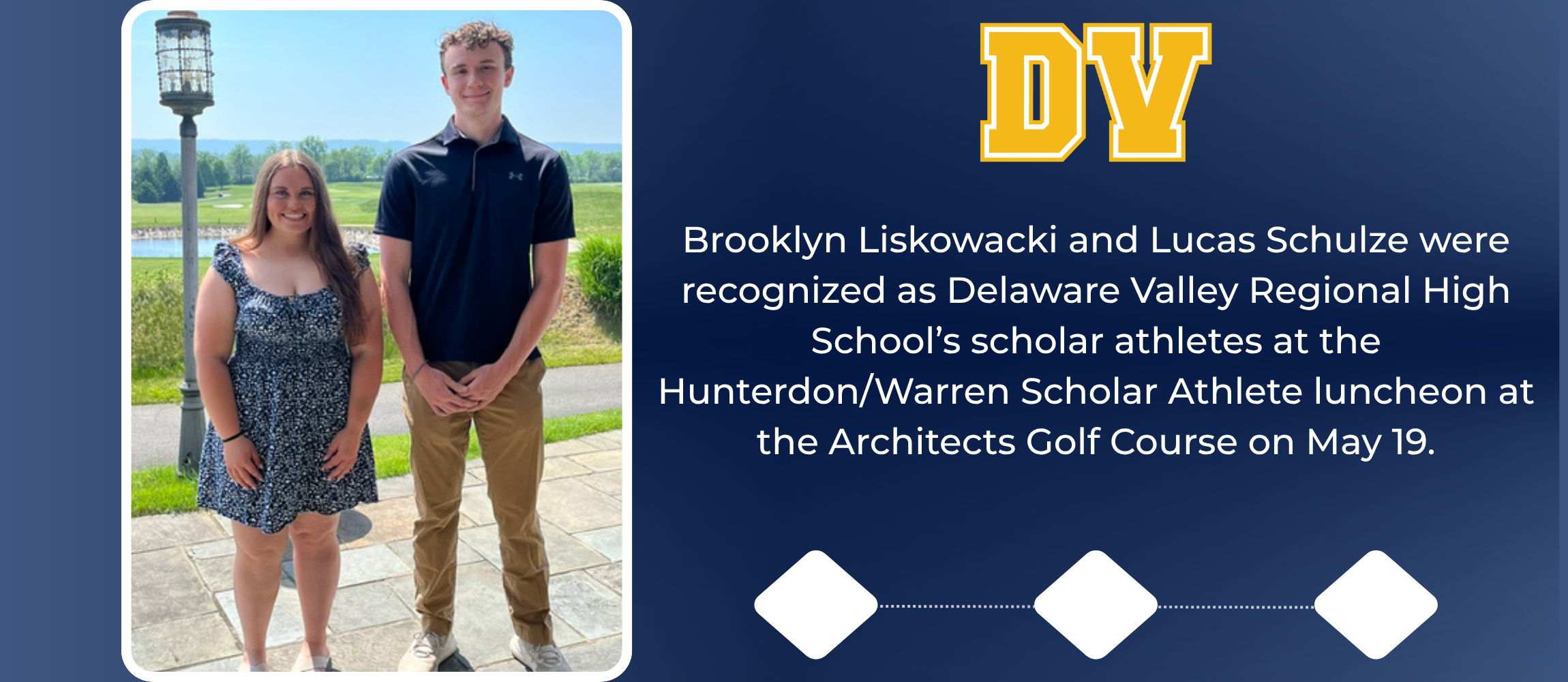 Brooklyn Liskowacki and Lucas Schulze stand together outside on a sunny day with green grass, blue sky, and lamp post in background.
