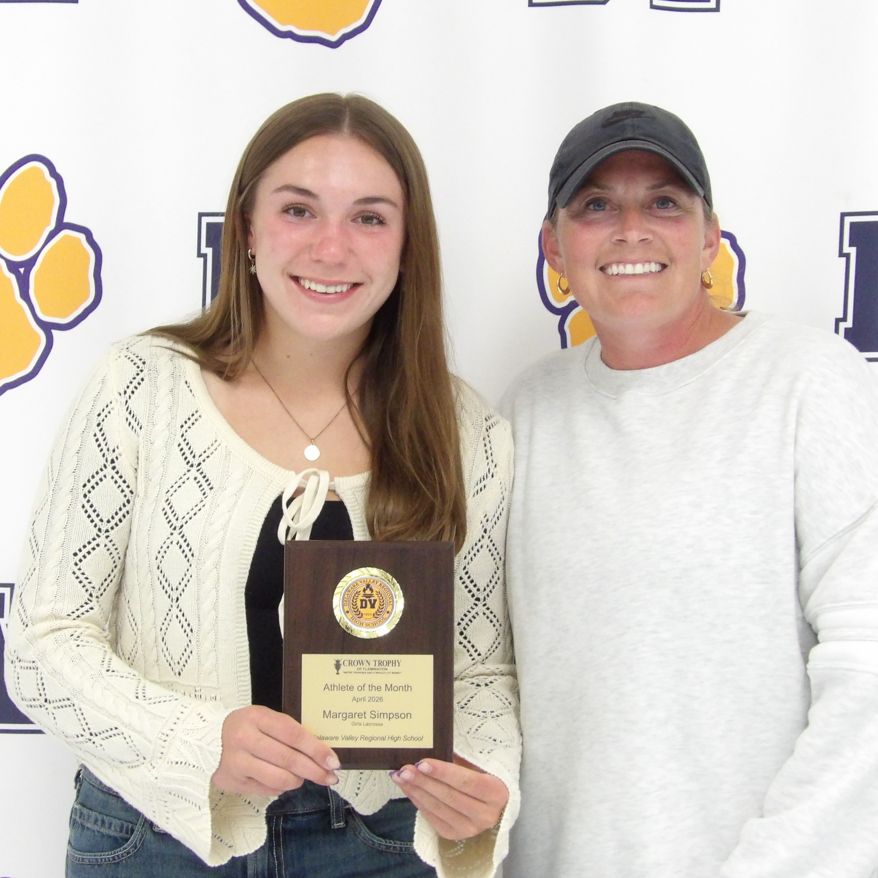 Margaret Simpson poses with Coach Rifflard