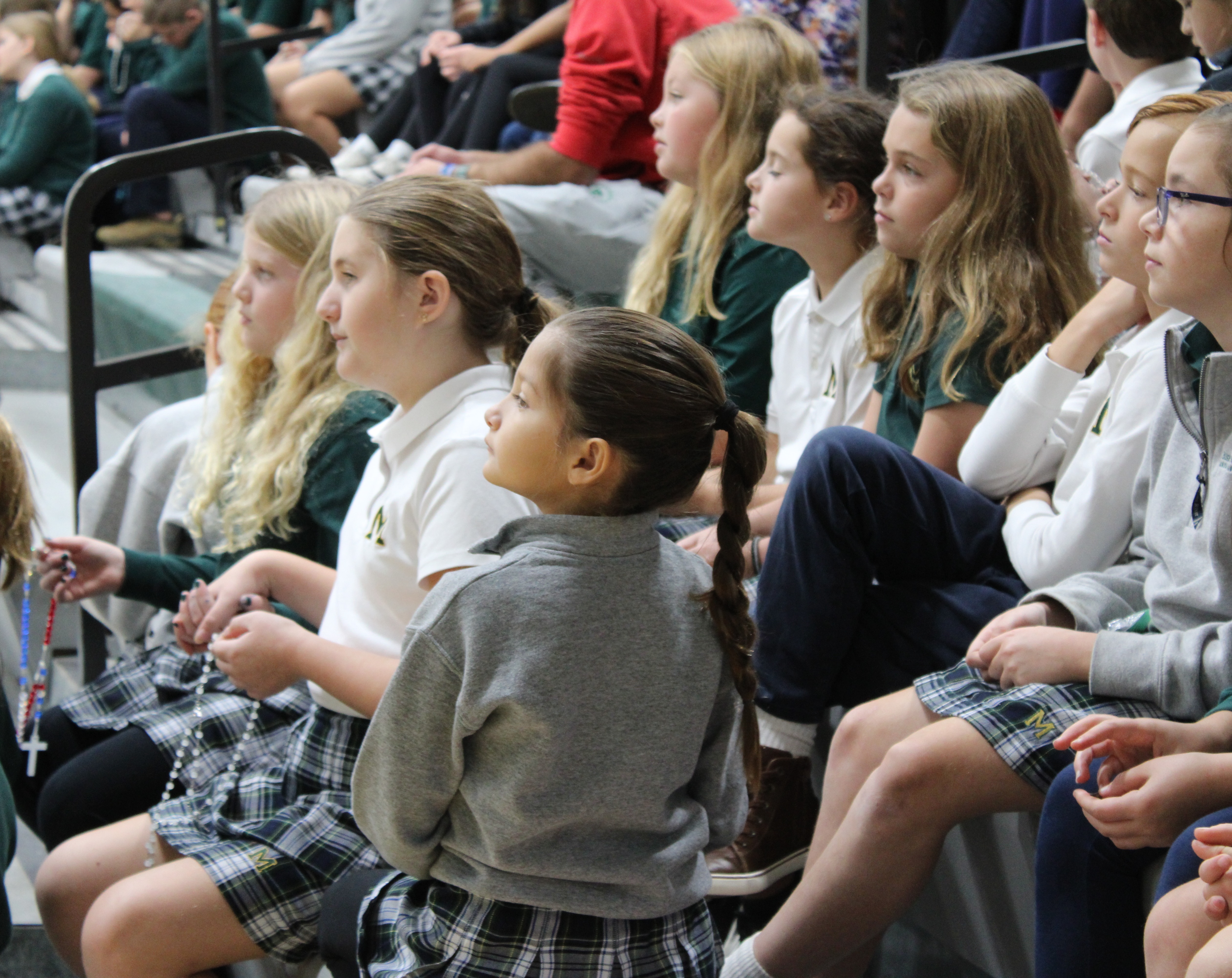 female child at all school rosary