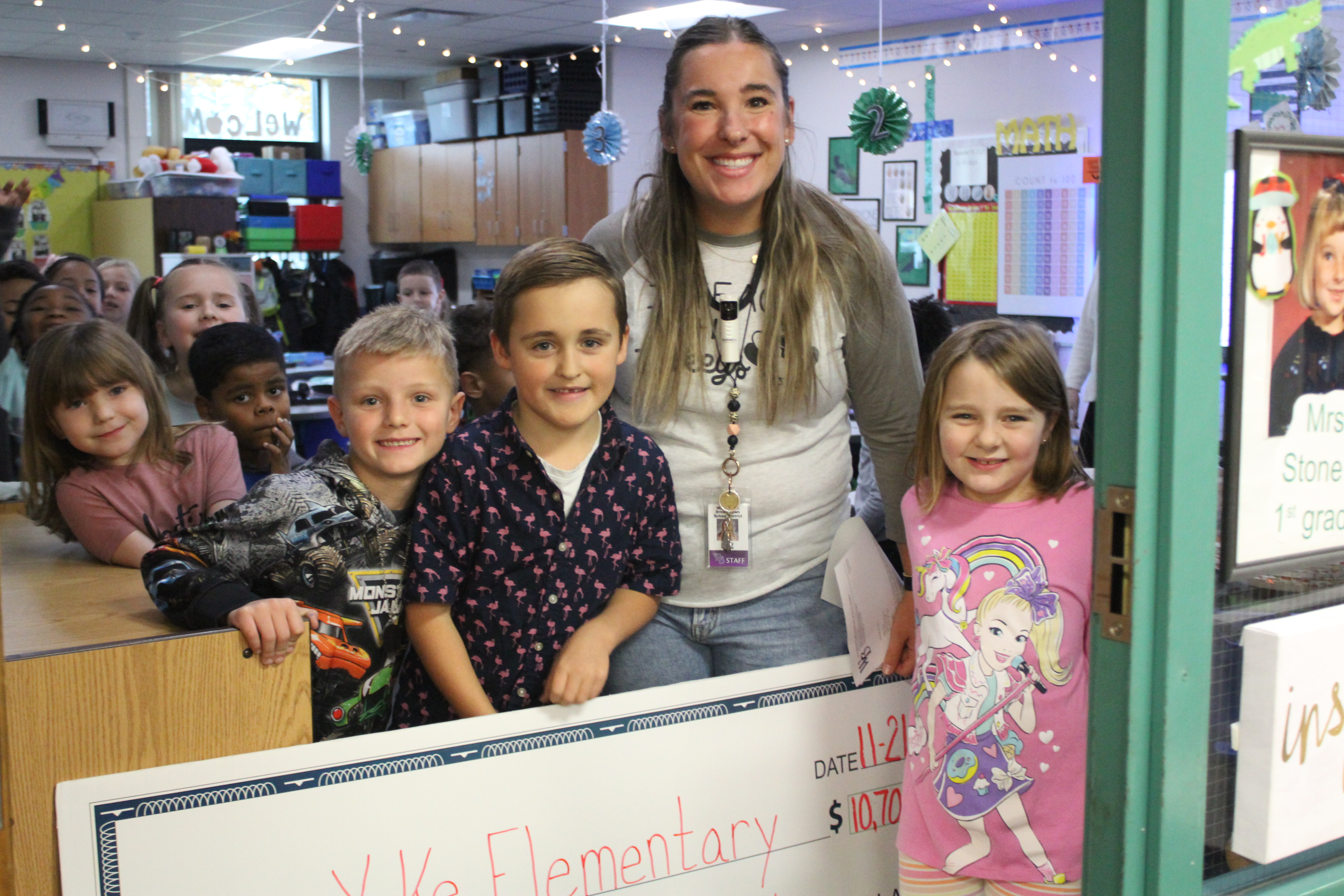 students teacher with check