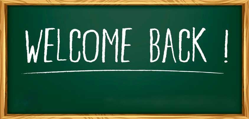 welcome back written on chalkboard