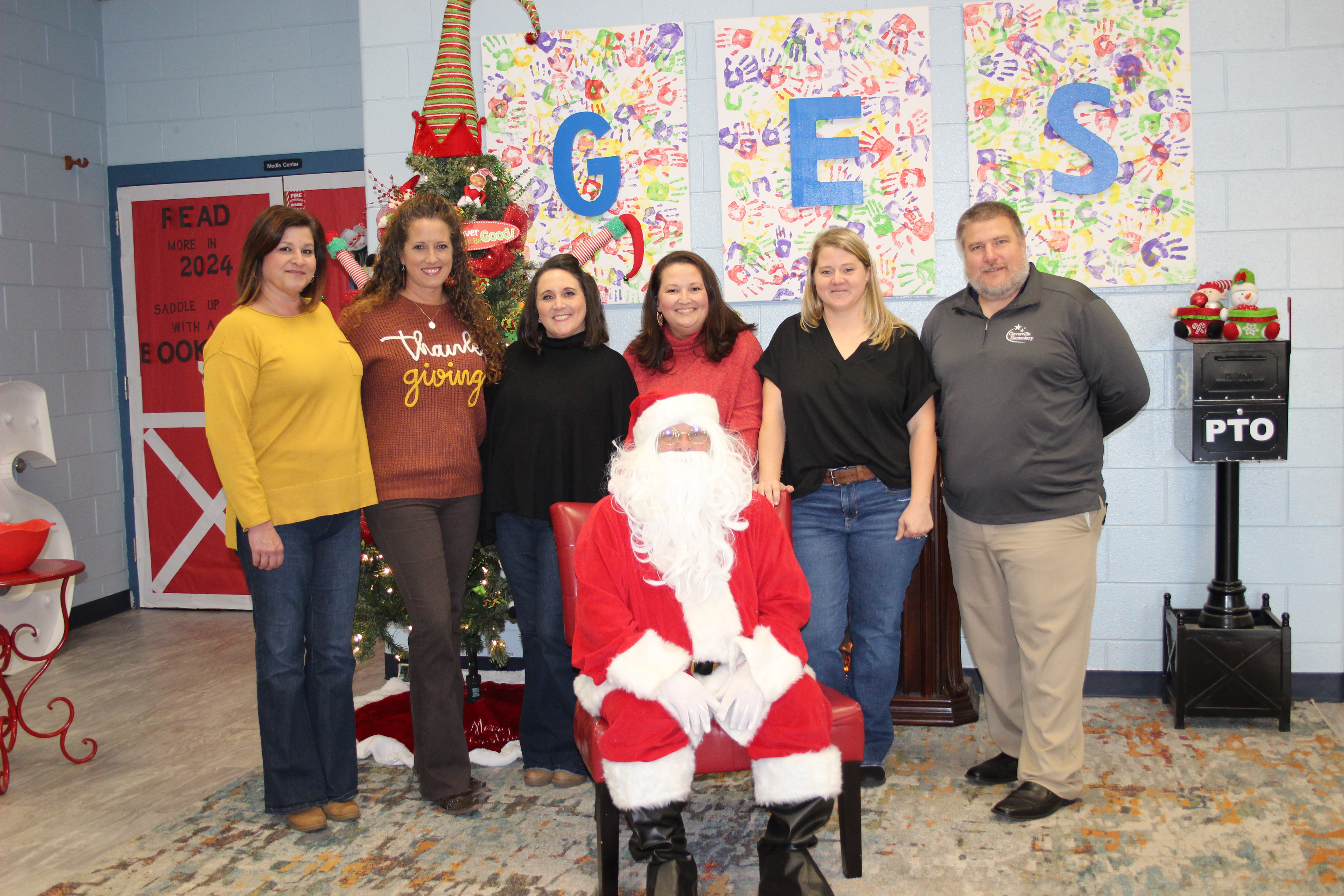 Office Employees with Santa