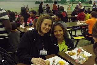 Muffins with Mom, Photos of the event with moms enjoying a nice treat with their children