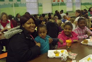 Muffins with Mom, Photos of the event with moms enjoying a nice treat with their children