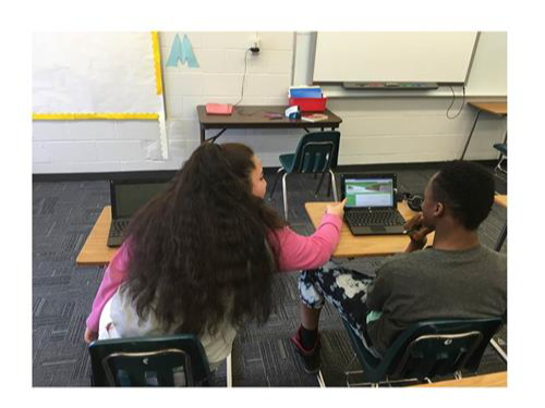 students on laptop