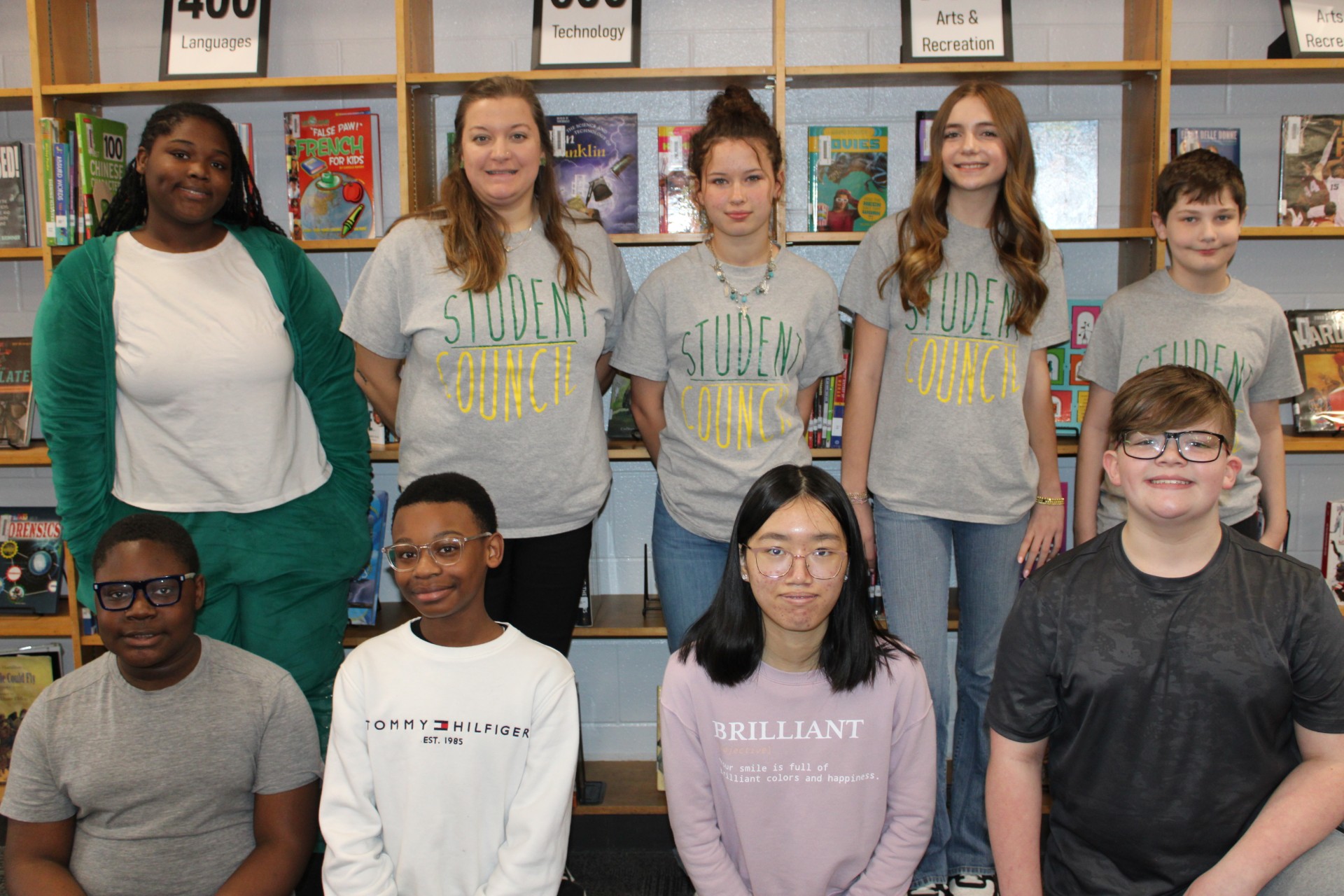 Student Members of Student Council standing with Adult Student Council Sponsor