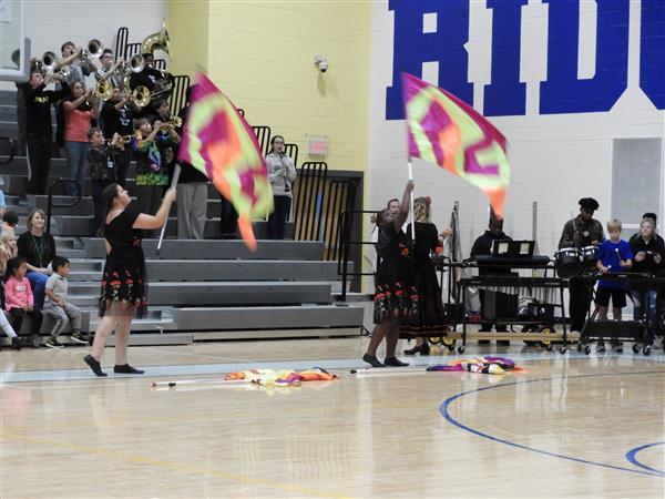 students performing at school event