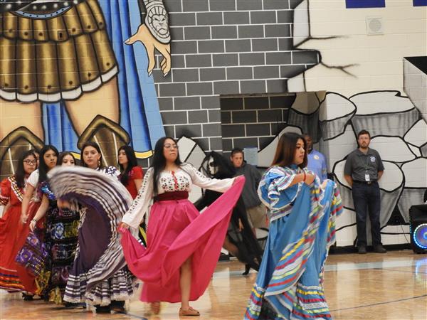 students performing at school event