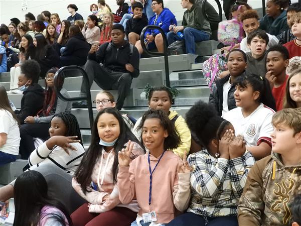 students sitting on the school bench