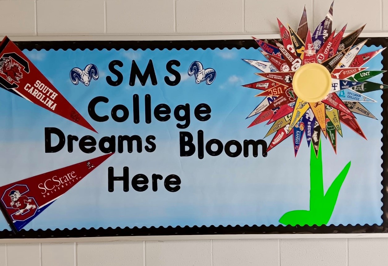 Bulletin Board that reads "Schofield Middle School College Dreams Bloom Here"