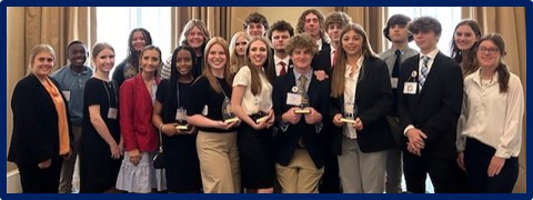 Students with trophies