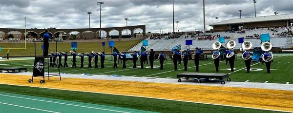 Band performing on football field