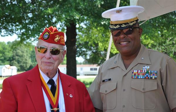 2 military men smilingly 