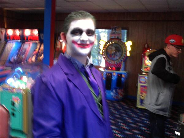 student with a joker costume 