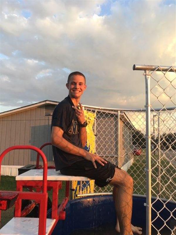 student sit at a cart 