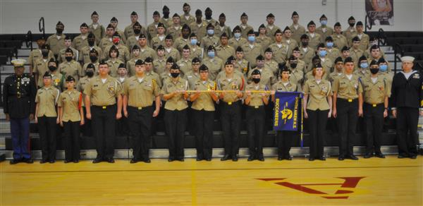 Group picture at gym and military uniform 