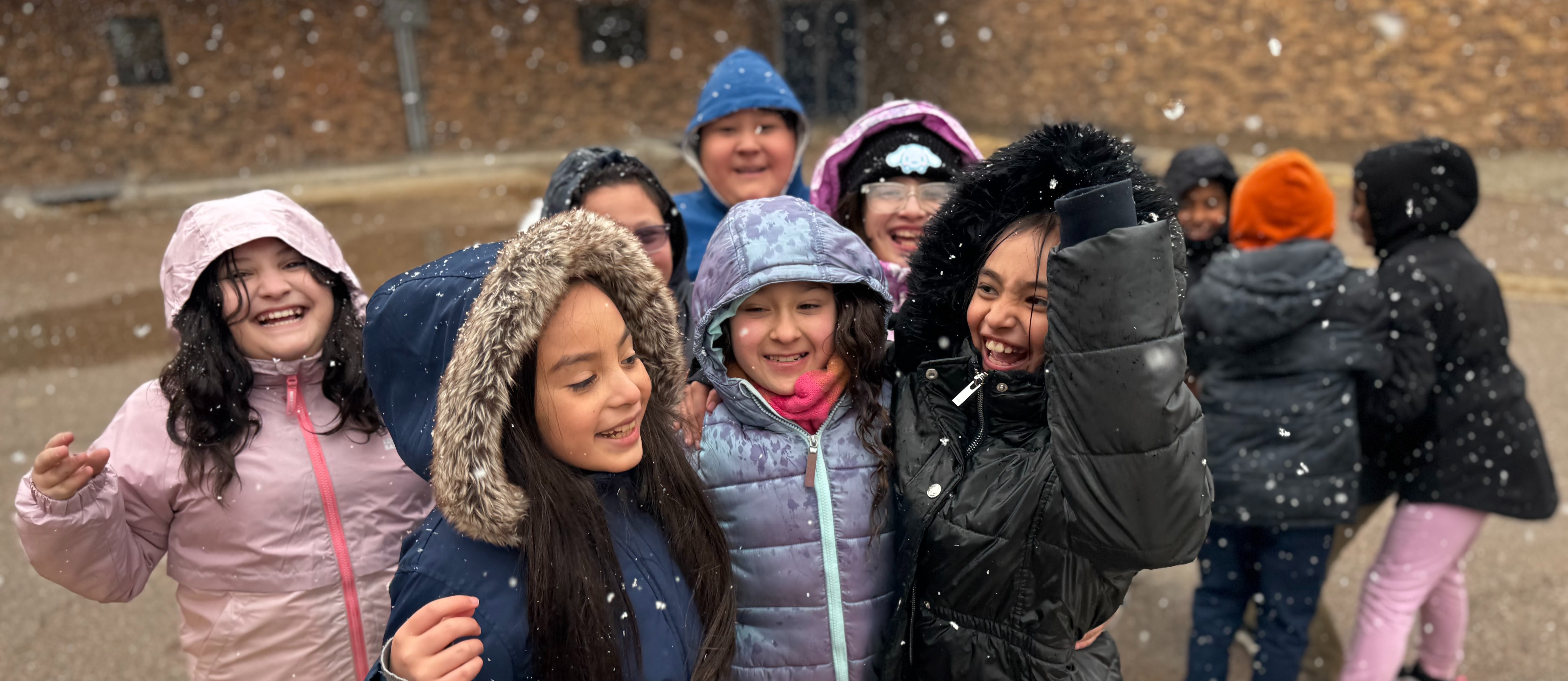 Aztec students playing in the snow.