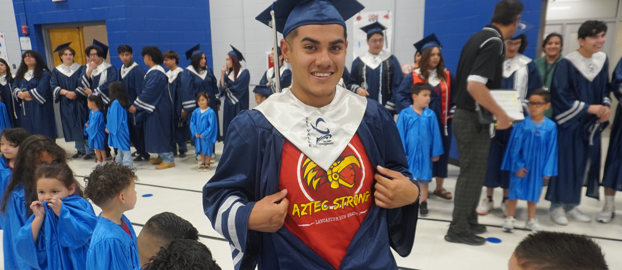 Aztecs returning to thier elementary school.