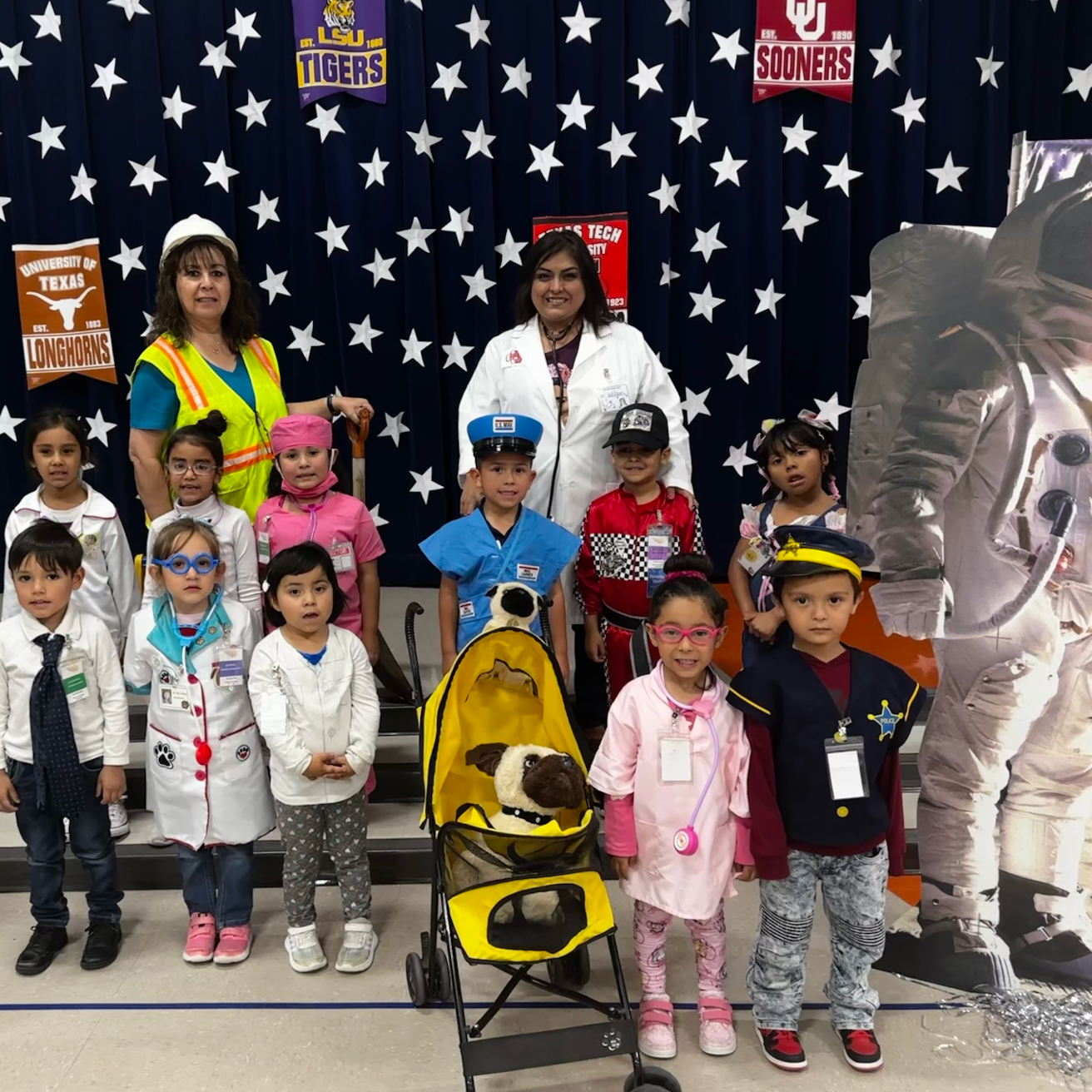 PreK students dressed in their future carreer uniforms